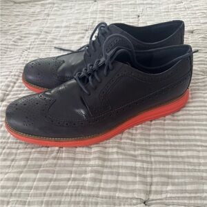 Cole Haan Black Wingtip Oxfords with Red Soles